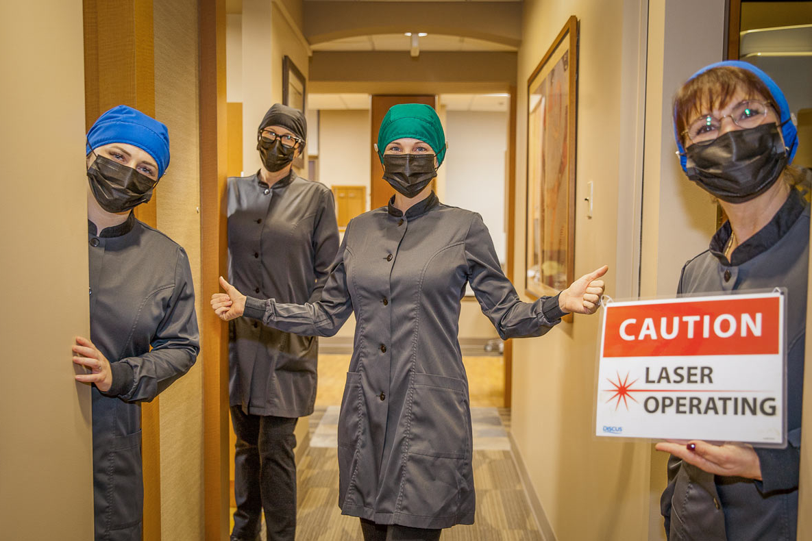 West Edge Dental team masked in the hallway